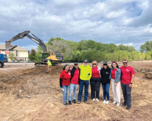Supporters of Veterans 1st, from Schreiber Foods along with Gail and Kim Nohr (first and third from the left), on the site of the planned village. Photo courtesy of Veterans 1st of Northeast Wisconsin (NEW)