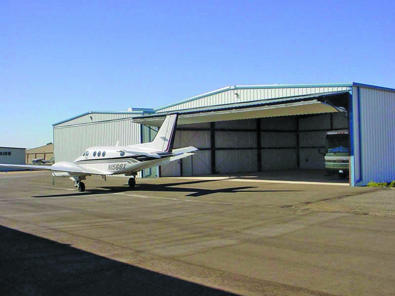 (Clockwise from top left) Agate, Inc. built 14 hangars at Ryan Field Airpark in Tucson, Ariz.; three executive hangars and 10 nested hangars with bi-fold doors at the airport in Kingman, Ariz.; and six T-hangars with 38-foot sliding doors at the Wickenburg, Ariz., airport. 
Agate, Inc. photos