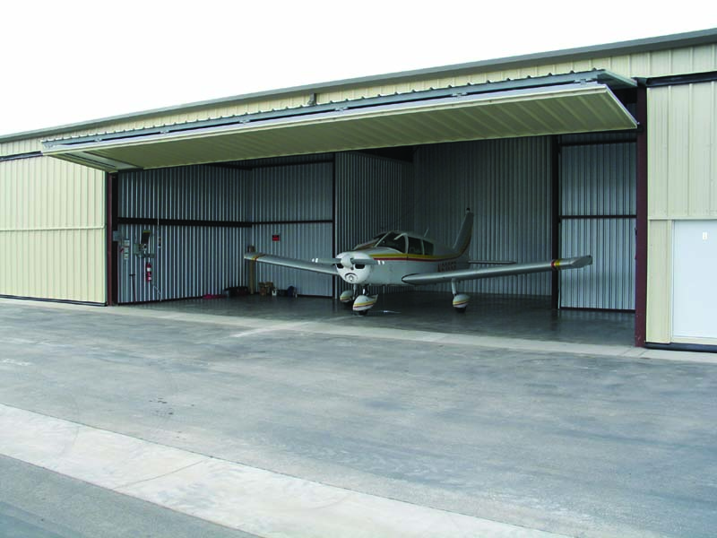 (Clockwise from top left) Agate, Inc. built 14 hangars at Ryan Field Airpark in Tucson, Ariz.; three executive hangars and 10 nested hangars with bi-fold doors at the airport in Kingman, Ariz.; and six T-hangars with 38-foot sliding doors at the Wickenburg, Ariz., airport. 
Agate, Inc. photos