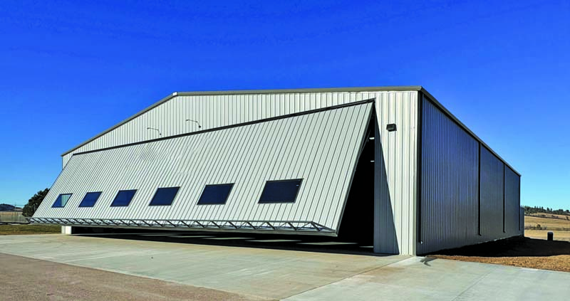 The right door is very important for aircraft hangars. This 80’ x22’ hydraulic door complete with turn-key installation fit the bill for this Spearfish, South Dakota hangar. Photo Courtesy of Powerlift Door.